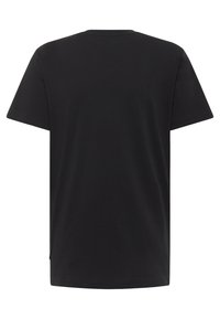 Schwarzes Baumwoll-T-Shirt mit einem lockeren Schnitt. Kurze Ärmel, runder Halsausschnitt und gerade Saum. Einfaches Design, keine auffälligen Muster oder Akzente.