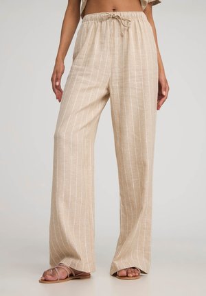 Pantaloni beige a gamba larga con strisce verticali bianche, dotati di una vita elastica e dettaglio con cordoncino. Tessuto morbido, vestibilità comoda.