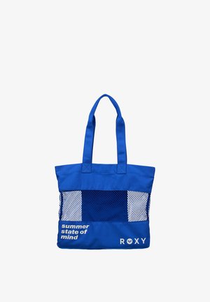 Blaue Tragetasche mit mittlerem Netzabschnitt, breiten Griffen und weißem Text "summer state of mind" sowie "ROXY"-Logo unten.