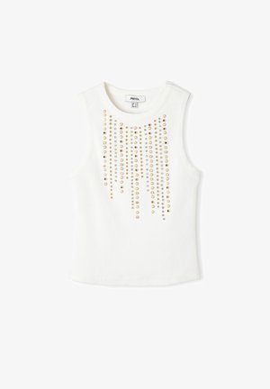 Biała bezrękawnik z prążkowanej tekstury. Posiada pionowy układ złotych i srebrnych cekinów z przodu, tworząc dekoracyjny wzór.
