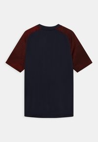 JAKO T-shirt de sport - marine/rot