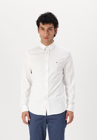 Tommy Hilfiger - PERFORMANCE SOLID SHIRT - Shirt - optic white Thumbnail Image 1