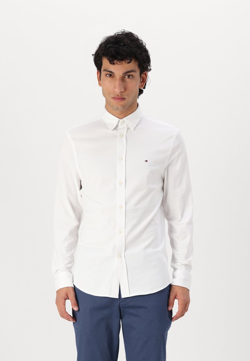Tommy Hilfiger - PERFORMANCE SOLID SHIRT - Shirt - optic white, Enlarge