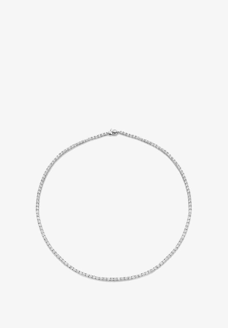 Sølvsmykke med en tynd, fleksibel kæde prydet med små, glitrende ædelsten, der skaber en kontinuerlig linje af glans.