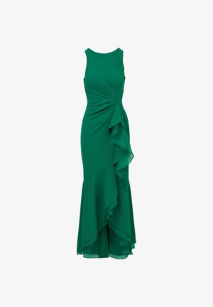 Green sleeveless dress with a fitted bodice, asymmetrical ruffle detail cascading from the waist. Smooth fabric with a slight sheen.