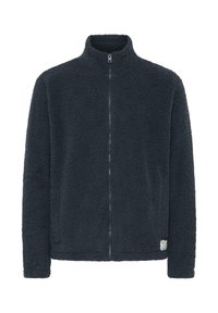 Giacca in pile di colore grigio scuro con colletto alto, zip frontale completa e texture morbida. Presenta una piccola etichetta logo in basso.