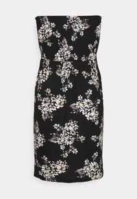 Svart strapless-klänning med en smockad bodice och blommönster i kräm och taupe. Har draperade detaljer och en rak fåll.