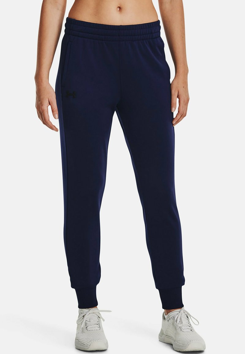 Marineblaue Baumwollmischung-Jogginghosen mit elastischem Bund, Seitentaschen, schmal zulaufendem Bein und gerippten Bündchen. Mit kleinem schwarzem Logo an der Seite.