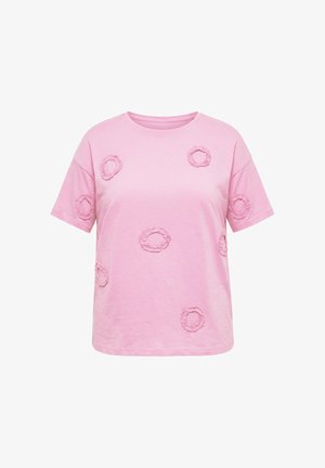 Světlounce růžové tričko s krátkými rukávy a kulatým výstřihem, zdobené texturovanými kruhovými volánky rozptýlenými na přední straně a rukávech.