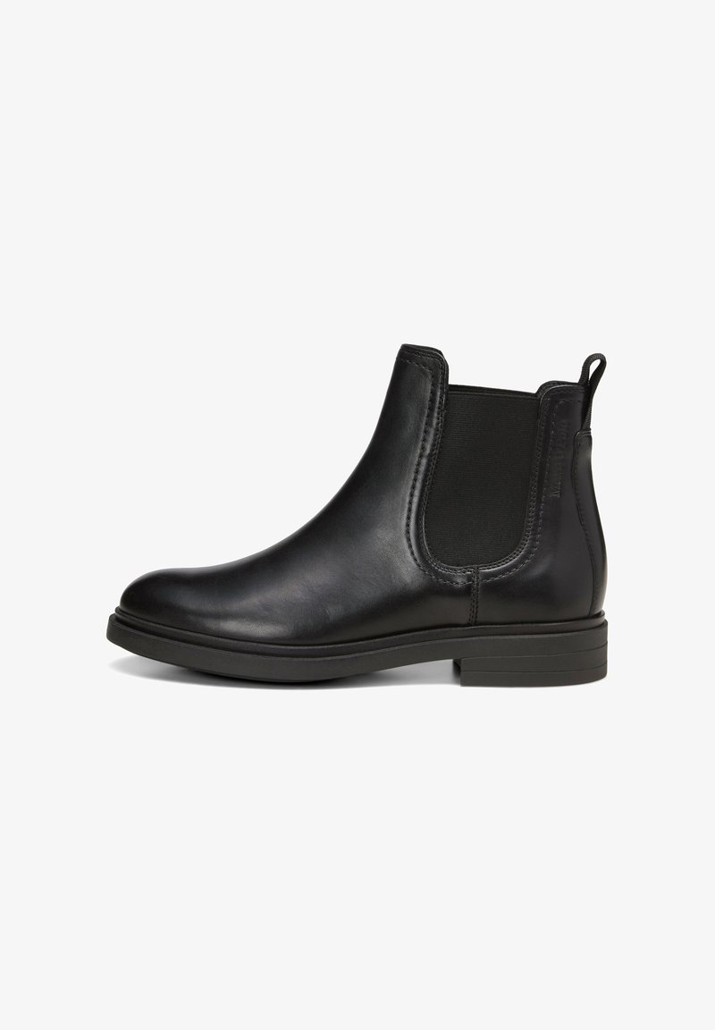 Bottine Chelsea en cuir noir avec panneau latéral élastique, languette au talon, petit talon empilé et bout arrondi.