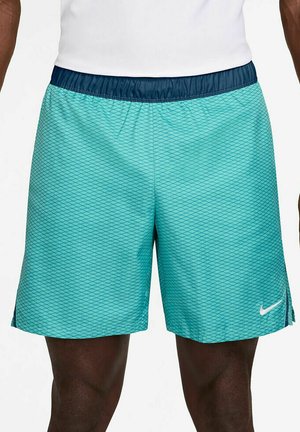 Turquoise athletic shorts with a diamond pattern, elastic navy waistband, and a white Nike logo on the lower front right side.