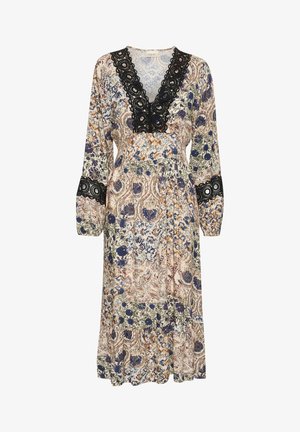 Ilga rankovė, gėlių suknelė su V formos iškirpte. Yra juoda nėrinių apdaila aplink iškirptę ir rankoves. Pagaminta iš lengvos, raštuotos medžiagos.