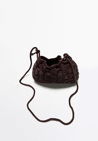 Small dark brown woven leather shoulder bag with braided strap and gathered top opening on white background.