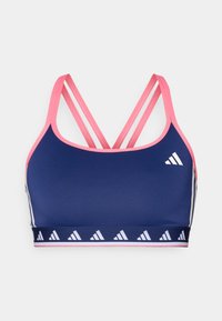 Navy sports bra with pink accents, featuring multiple straps and a patterned band with white triangular logos at the bottom. Smooth texture.