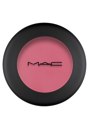 Round MAC blush compact with a matte black casing, featuring a soft, light pink powder interior with a textured surface and logo.