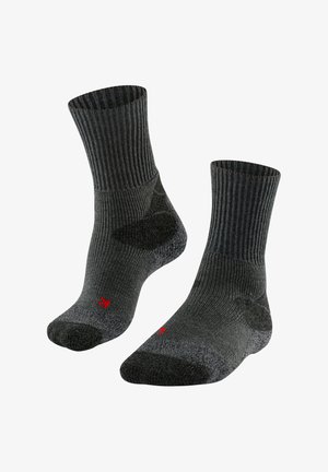 Graue, gerippte Socken mit gepolstertem Fersen- und Zehenbereich. Mit rotem Logo an der Seite. Mittlere Schafthöhe. Weiches, strukturiertes Material.