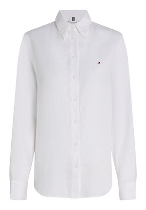 Bela dolga srajca z gumbi, z ostrim ovratnikom in majhnim logotipom Tommy Hilfiger na prsih.