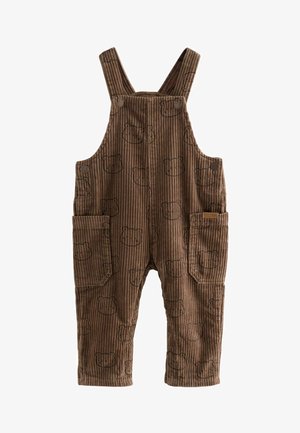 Braune Corduroy-Latzhosen mit vertikalen Streifen, die ein Bärenkopf-Muster aufweisen, zwei vordere Taschen haben und über verstellbare Träger verfügen.