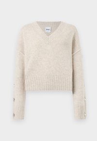 Pull beige en maille avec col en V, ourlet et poignets côtelés, orné de boutons décoratifs le long des manches extérieures.