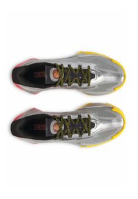 Athletic shoes with a silver mesh upper, black accents, yellow toe, pink heel, and black and yellow laces. Cushioned insole details visible.