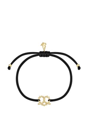 Pulsera de cordón ajustable negra con un pequeño colgante de pretzel dorado en el centro y detalles de cuentas doradas en los extremos.