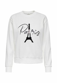 Sudadera blanca de manga larga con torre Eiffel de lentejuelas negras y texto "París" en script negro en la parte frontal.