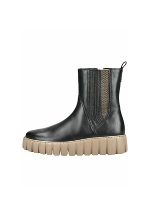 Bottine en cuir noir avec semelle épaisse crantée couleur beige et panneau latéral élastique avec languette au talon.