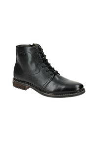 Schwarze Leder-Stiefeletten mit gesteppten Akzenten, runder Zehenform und Schnürdesign. Merkmale sind ein kleiner Holzabsatz und ein grünes Innenfutter.