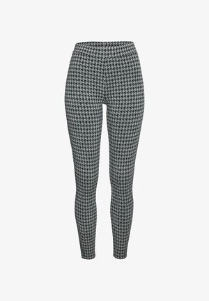 Legingi ar raustainu rakstu melnā un pelēkā krāsā. Izgatavoti no elastīga materiāla, ar augstu jostasvietu.