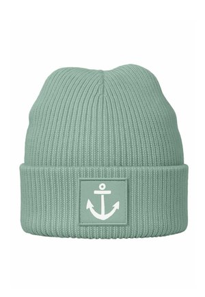 Mint green knitted beanie made of ribbed fabric, featuring a prominent white anchor logo on a square patch at the cuff.