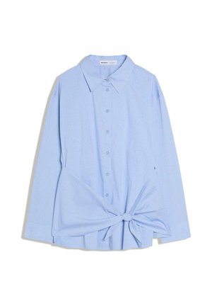 Light blue long-sleeve button-up shirt with a pointed collar and front fabric knot detail at the waist.