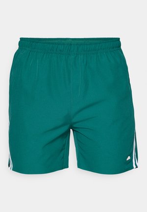 Vīriešu peldbikses teal krāsā, ar elastīgu jostasvietu, divām baltām sānu svītrām un mazu logo detaļu apakšmalā.