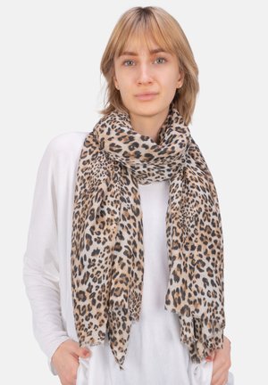 Leopard print scarf made of lightweight fabric, featuring a tan background with black and brown spots, finished with frayed edges.