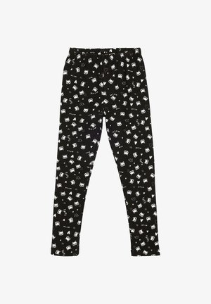 Leggings negros con caras de gatos blancos, corazones y las palabras "miau" y "lindo" impresas por toda la tela, con una cinturilla elástica.
