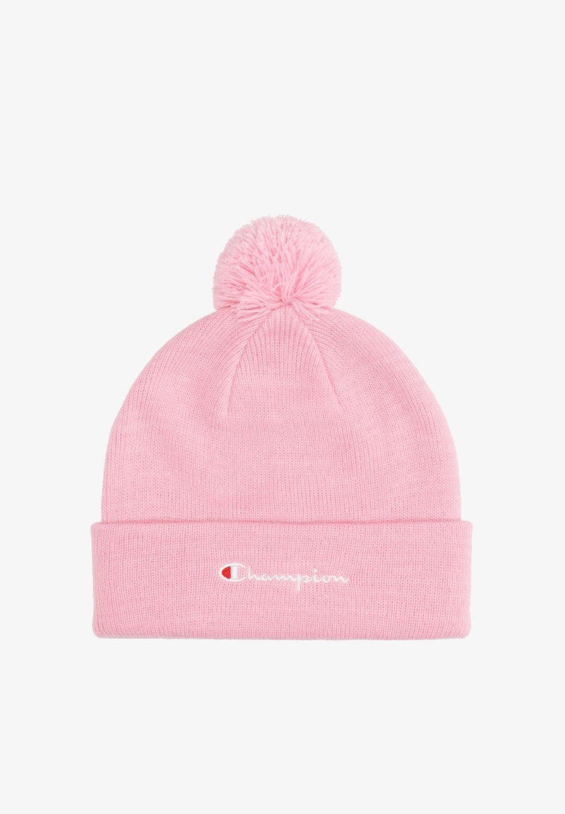 Roze gebreide beanie met een pompon bovenop en een opgerolde rand met een wit geborduurd "Champion" logo. Zachte textuur en aangesloten ontwerp.