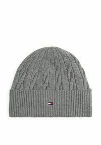 Gray knitted beanie with cable pattern and ribbed cuff. Features a small logo in red, white, and blue on the front. Soft texture.