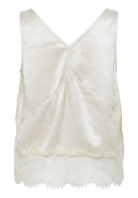 Top senza maniche di un beige chiaro con un tessuto testurizzato, scollatura a V sul retro e un orlo in pizzo con bordi ondulati.