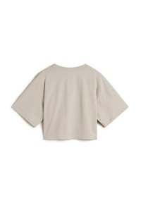 Short-sleeve, cropped t-shirt in light beige cotton. Features a round neck and oversized sleeves with a smooth, plain texture.