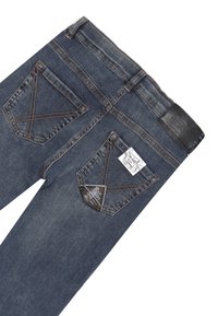 Jeans skinny in denim blu scuro, con due tasche posteriori con dettagli di cucitura e una etichetta in pelle marchiata in vita.