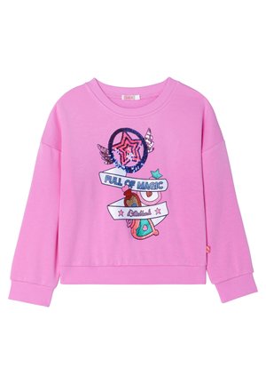 Różowa bluza z długim rękawem z wzorem gwiazdy i skrzydeł, błyszczącymi cekinami oraz napisem „Full of Magic” na przodzie.