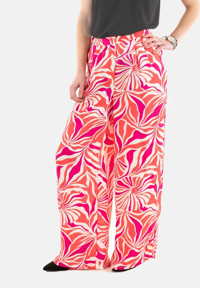 Pantalones de pierna ancha con un vibrante patrón en tonos de rosa y coral, fabricados en un tejido suave con un ligero brillo. Cintura elástica.