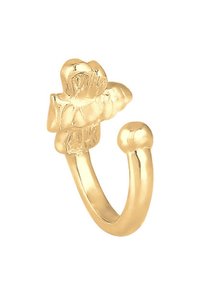Bague en or conçue avec des accents floraux et une finition lisse et polie. Présente une forme courbée avec une petite perle à une extrémité.
