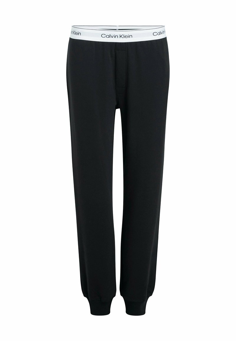 Schwarze Jogginghose aus einem weichen Baumwollmix, mit einem elastischen Taillenbund mit "Calvin Klein"-Logo und gerippten Bündchen an den Knöcheln.