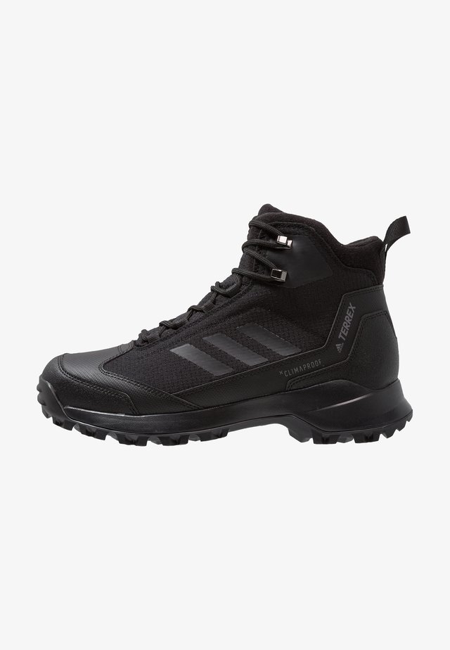 TERREX HERON MID WINTER HIKING SHOES - Fjellsko - core black/grey four