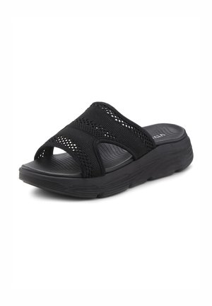 Black slide sandals featuring a textured upper with mesh design, a cushioned sole, and an open-toe style for breathability.