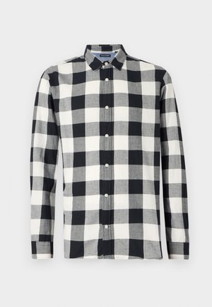 Long-sleeve shirt in black and white checkered pattern, made of fabric with a smooth texture. Features a button-down collar and front buttons.