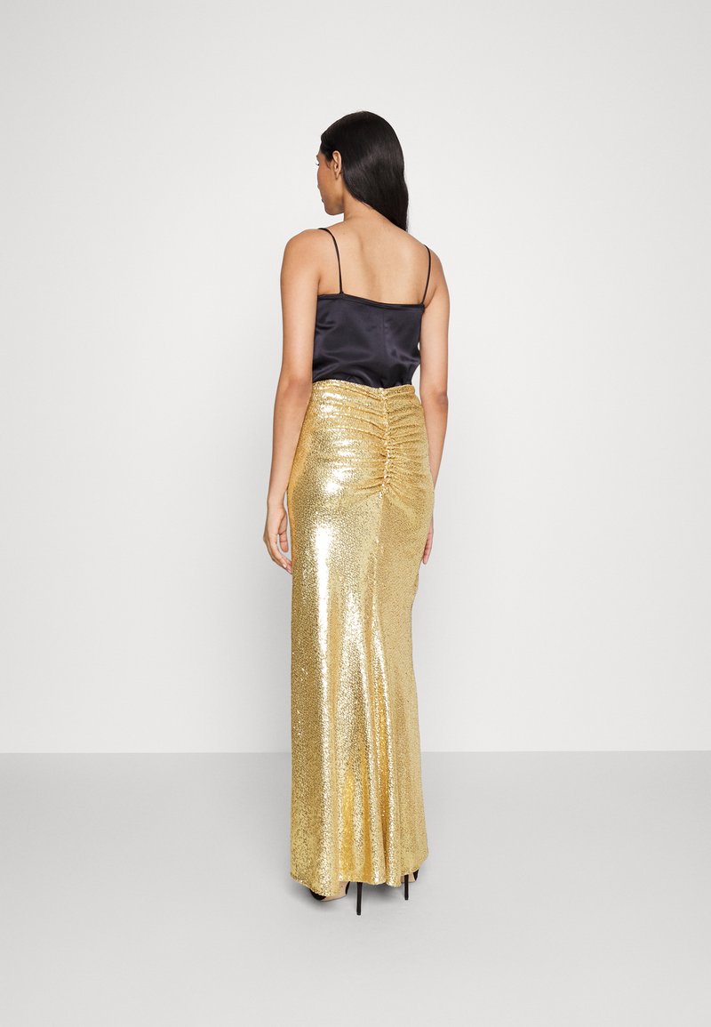 long gold skirt