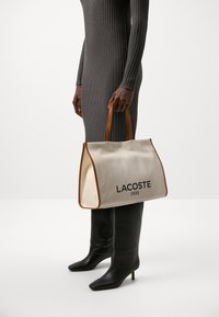 Lacoste HERITAGE  - Tote bag - natural/tan