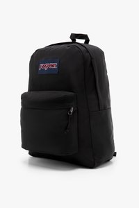 Sac à dos Jansport noir avec dos rembourré, poche zippée à l'avant et patch logo. Présente une texture lisse et une forme rectangulaire standard.
