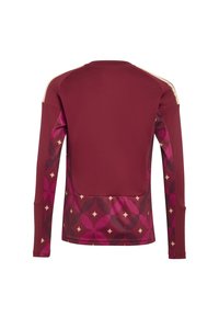 Long-sleeve athletic top with maroon solid upper back and geometric pink and red patterned lower back and sleeves.